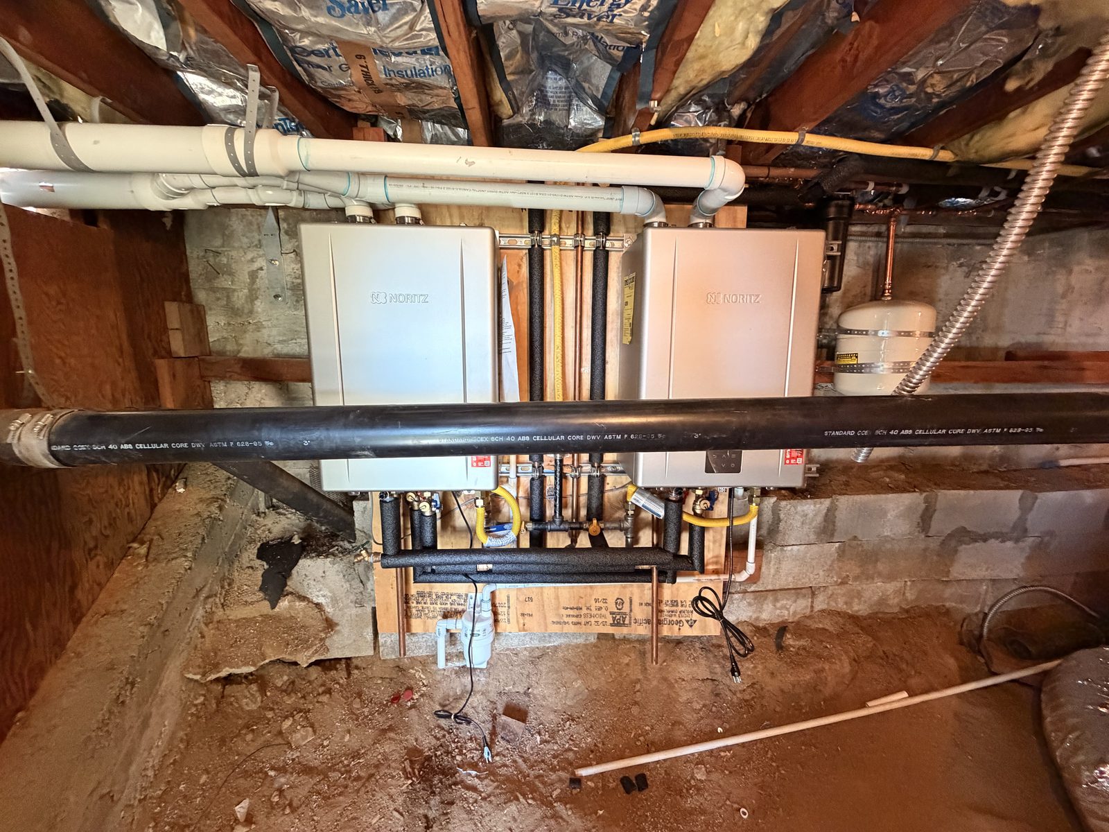 Dual tankless water heater installation with copper manifold